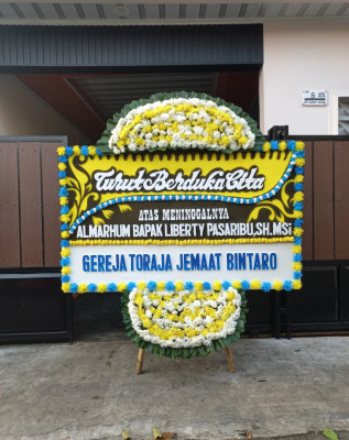 Papan Bunga Duka di Murtigading